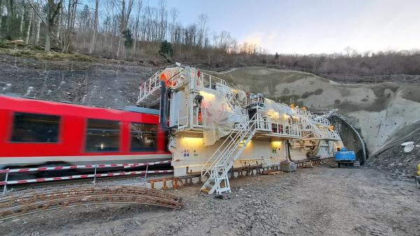 Herrenknecht Tunnel Enlargement System - Train entering tunnel in process of enlargement